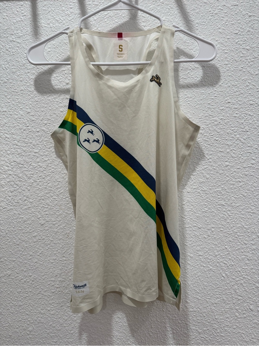 Tracksmith Bannister Tank with Green, Yellow & Navy Diagonal Stripes